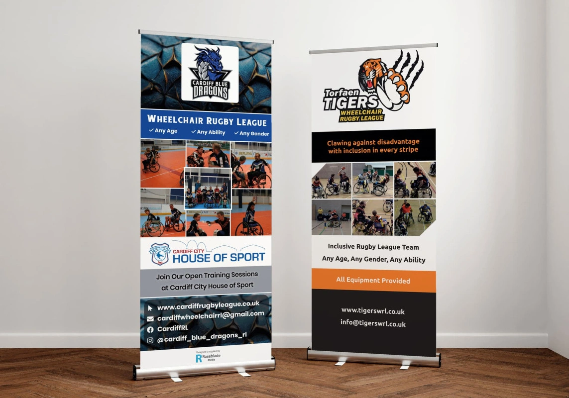 Two pop-up banners advertising sports clubs - Cardiff Blue Dragons and Torfaen Tigers